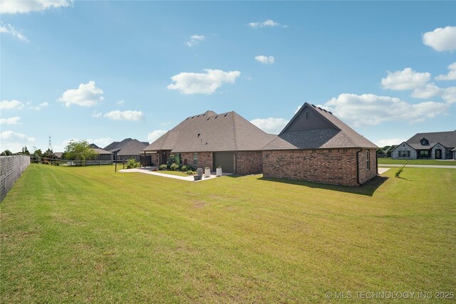 9015 N 65th E Pl, Owasso, OK 74055 - view of yard featuring a patio area