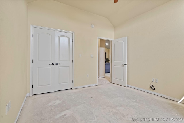 4180 Countyline, Ardmore, OK 73401 - unfurnished bedroom with lofted ceiling, baseboards, a ceiling fan, and a closet