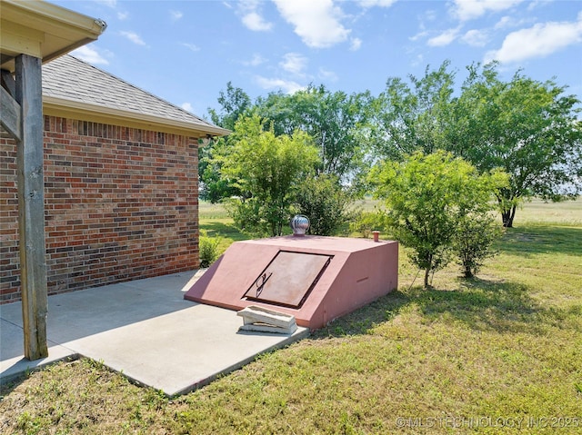 4180 Countyline, Ardmore, OK 73401 - view of storm shelter featuring a yard