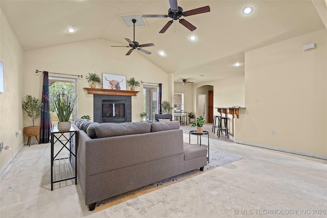 4180 Countyline, Ardmore, OK 73401 - living area featuring ceiling fan, recessed lighting, a fireplace, baseboards, and arched walkways