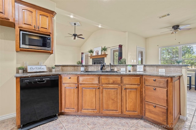 4180 Countyline, Ardmore, OK 73401 - kitchen featuring black dishwasher, a ceiling fan, stainless steel microwave, a sink, and lofted ceiling