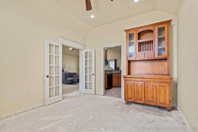 4180 Countyline, Ardmore, OK 73401 - empty room with french doors, a ceiling fan, lofted ceiling, recessed lighting, and baseboards