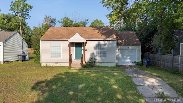1228 S Erie Ave, Tulsa, OK 74112 - bungalow-style house with crawl space, driveway, and a garage