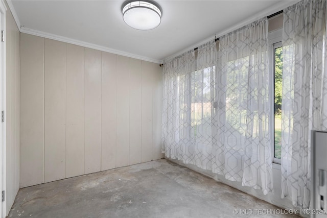 1228 S Erie Ave, Tulsa, OK 74112 - unfurnished room with crown molding and unfinished concrete flooring