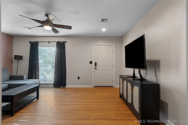 1228 S Erie Ave, Tulsa, OK 74112 - living area with ceiling fan, baseboards, light wood-style flooring, and recessed lighting