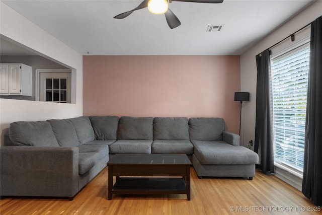 1228 S Erie Ave, Tulsa, OK 74112 - living area featuring ceiling fan and light wood finished floors