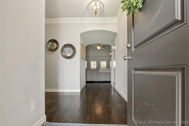 18403 E 50th St, Tulsa, OK 74134 - entrance foyer with wood finished floors, baseboards, crown molding, ceiling fan, and arched walkways