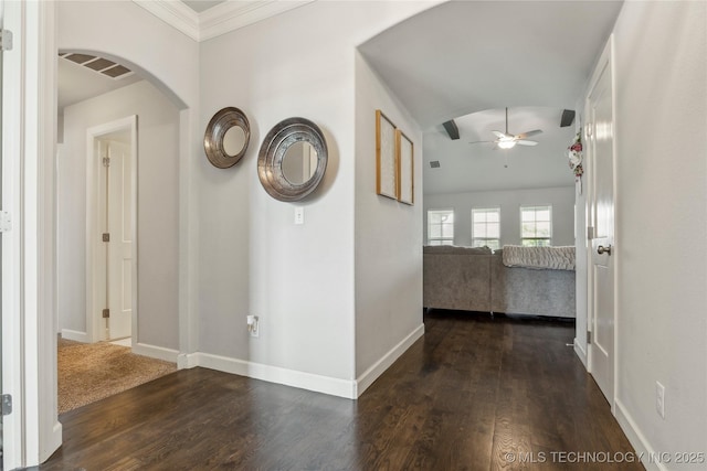 18403 E 50th St, Tulsa, OK 74134 - hallway with arched walkways, dark wood-type flooring, and baseboards