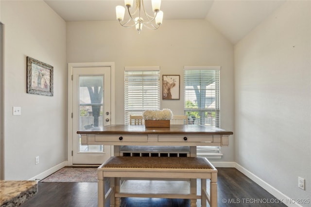 18403 E 50th St, Tulsa, OK 74134 - dining area featuring a chandelier, wood finished floors, vaulted ceiling, and baseboards