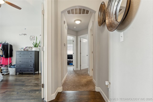 18403 E 50th St, Tulsa, OK 74134 - corridor featuring arched walkways, baseboards, and wood finished floors