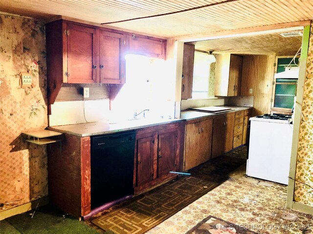 1145 S Little Ave, Cushing, OK 74023 - kitchen featuring white gas stove, dishwasher, dark brown cabinets, and light countertops