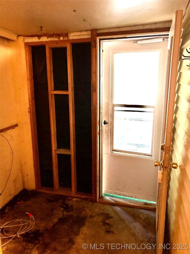 1145 S Little Ave, Cushing, OK 74023 - doorway featuring unfinished concrete floors