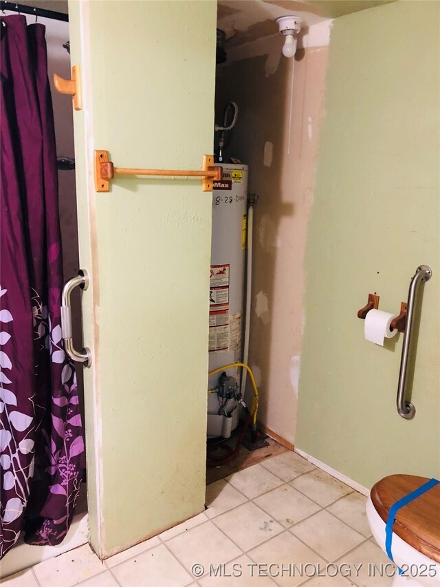 1145 S Little Ave, Cushing, OK 74023 - utility room featuring gas water heater