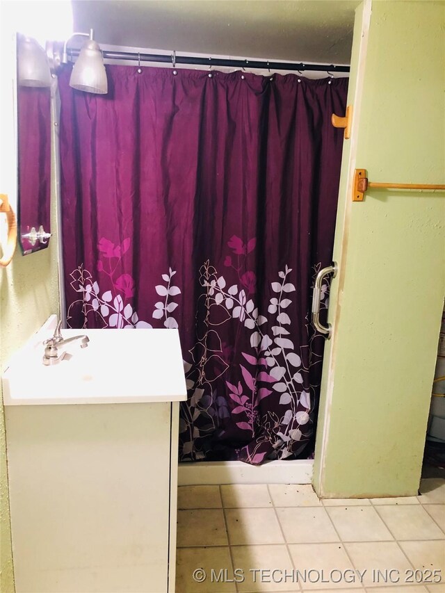 1145 S Little Ave, Cushing, OK 74023 - bathroom with vanity and curtained shower