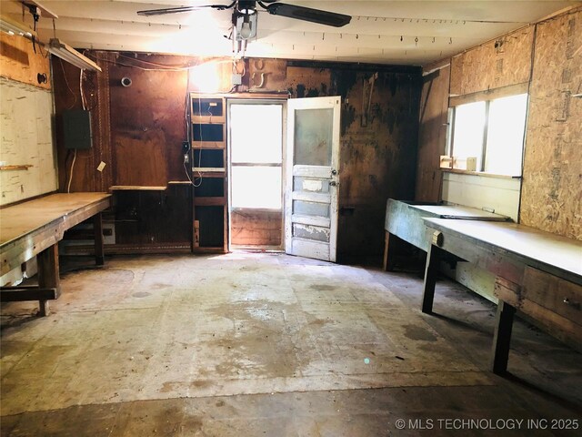 1145 S Little Ave, Cushing, OK 74023 - misc room with ceiling fan and a workshop area