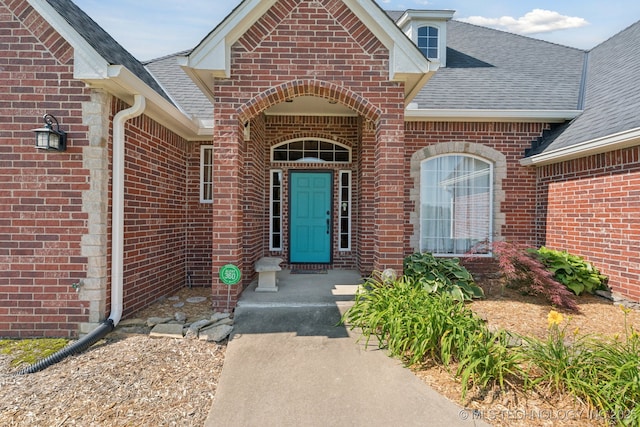 316 E 44th St, Sand Springs, OK 74063 - entrance to property with roof with shingles and brick siding