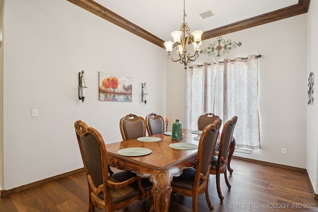 316 E 44th St, Sand Springs, OK 74063 - dining area featuring a chandelier, crown molding, and wood finished floors