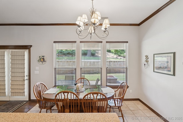 316 E 44th St, Sand Springs, OK 74063 - dining room with crown molding, a chandelier, and light tile patterned flooring