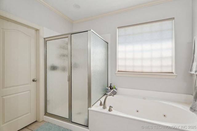 316 E 44th St, Sand Springs, OK 74063 - bathroom with a stall shower, a jetted tub, ornamental molding, and tile patterned flooring