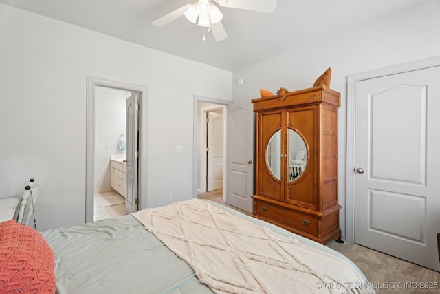 316 E 44th St, Sand Springs, OK 74063 - bedroom with light carpet, ensuite bath, and ceiling fan