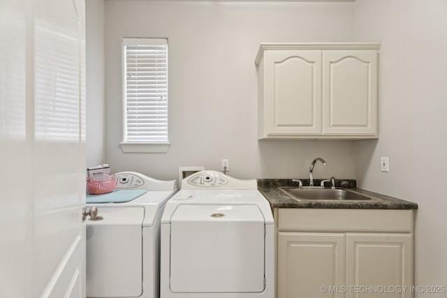 316 E 44th St, Sand Springs, OK 74063 - laundry area featuring washing machine and clothes dryer, plenty of natural light, and cabinet space