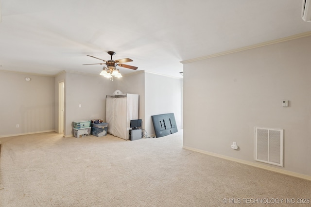 316 E 44th St, Sand Springs, OK 74063 - spare room featuring ornamental molding, a ceiling fan, carpet, and a wall mounted AC