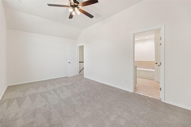 2817 W Oakland St, Broken Arrow, OK 74012 - carpeted spare room with a ceiling fan, vaulted ceiling, and baseboards