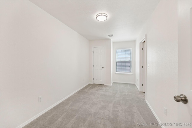 2817 W Oakland St, Broken Arrow, OK 74012 - unfurnished room with light colored carpet and baseboards