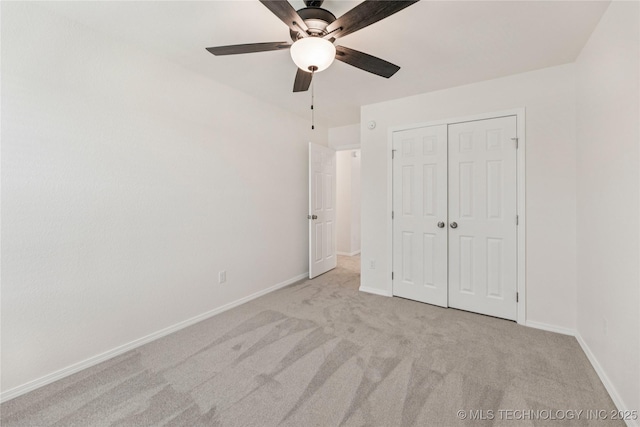 2817 W Oakland St, Broken Arrow, OK 74012 - unfurnished bedroom featuring light colored carpet, baseboards, and a closet
