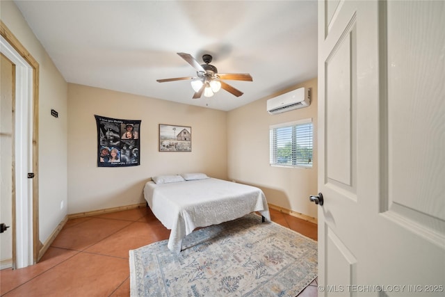 1200 S Oak Grove Rd, Cushing, OK 74023 - bedroom with a wall mounted air conditioner, light tile patterned floors, baseboards, and a ceiling fan