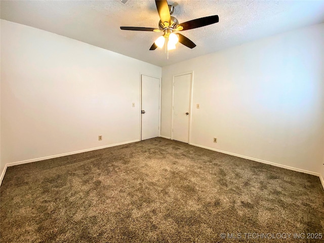 7205 S Date Pl, Broken Arrow, OK 74011 - unfurnished room with a ceiling fan, dark colored carpet, baseboards, and a textured ceiling