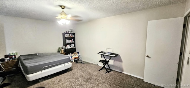 7205 S Date Pl, Broken Arrow, OK 74011 - carpeted bedroom with a textured ceiling and a ceiling fan
