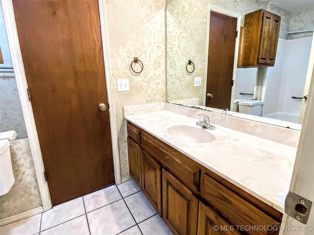 7205 S Date Pl, Broken Arrow, OK 74011 - bathroom featuring vanity, tile patterned flooring, wallpapered walls, and shower / tub combination