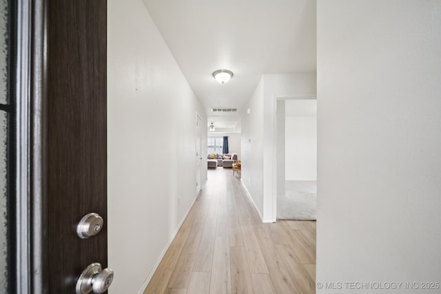 510 S Creek St, Skiatook, OK 74070 - corridor featuring light wood-style flooring and baseboards