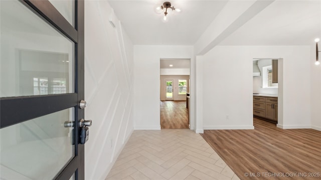 2508 W Birmingham St, Broken Arrow, OK 74011 - hallway with baseboards and light wood-style flooring