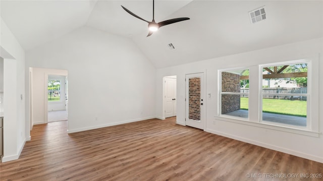 2508 W Birmingham St, Broken Arrow, OK 74011 - unfurnished living room featuring a ceiling fan, wood finished floors, baseboards, and high vaulted ceiling
