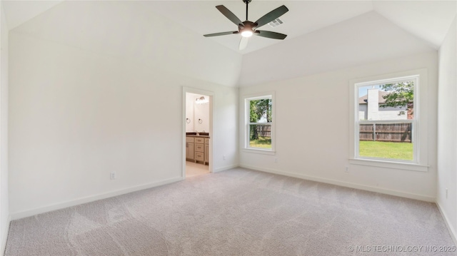 2508 W Birmingham St, Broken Arrow, OK 74011 - unfurnished bedroom with light colored carpet, multiple windows, baseboards, and lofted ceiling
