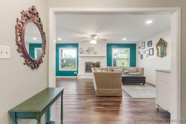 412 W Los Angeles St, Broken Arrow, OK 74011 - living area featuring a ceiling fan, wood finished floors, a fireplace, and recessed lighting
