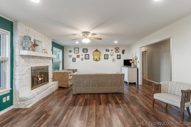 412 W Los Angeles St, Broken Arrow, OK 74011 - living room with dark wood finished floors, a ceiling fan, a fireplace, recessed lighting, and ornamental molding