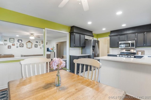 412 W Los Angeles St, Broken Arrow, OK 74011 - dining room with ceiling fan and recessed lighting