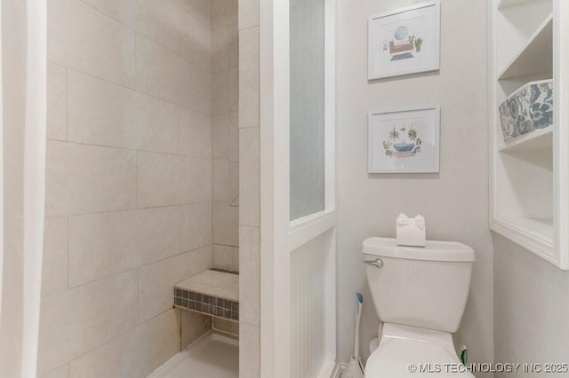 412 W Los Angeles St, Broken Arrow, OK 74011 - bathroom featuring toilet and a tile shower