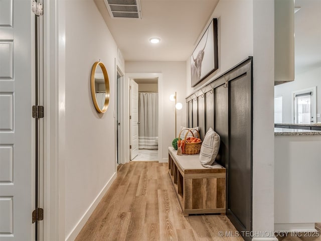 7221 S Indianwood Ave, Broken Arrow, OK 74011 - hallway with light wood-style floors and baseboards