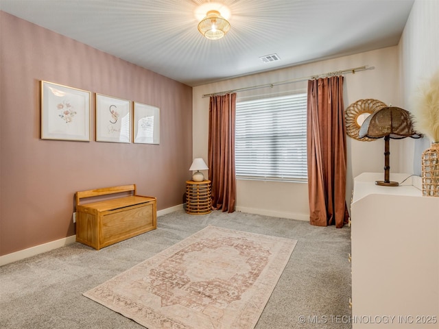 7221 S Indianwood Ave, Broken Arrow, OK 74011 - sitting room with carpet floors, healthy amount of natural light, and baseboards