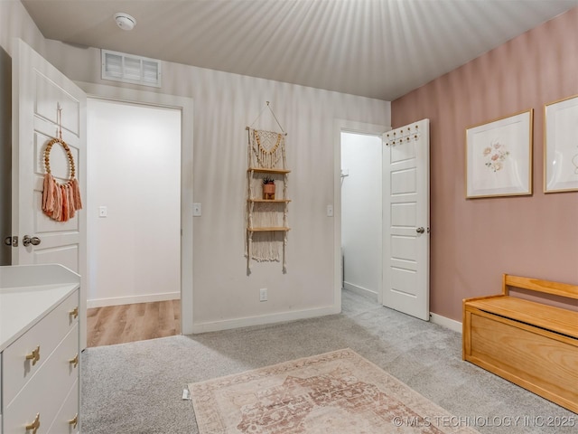 7221 S Indianwood Ave, Broken Arrow, OK 74011 - bedroom featuring light colored carpet and baseboards