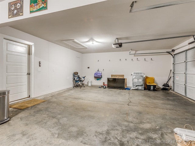 7221 S Indianwood Ave, Broken Arrow, OK 74011 - garage with a garage door opener
