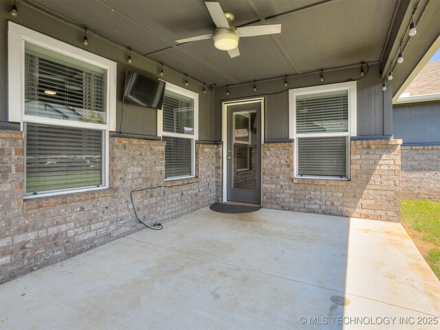 7221 S Indianwood Ave, Broken Arrow, OK 74011 - view of patio / terrace featuring ceiling fan