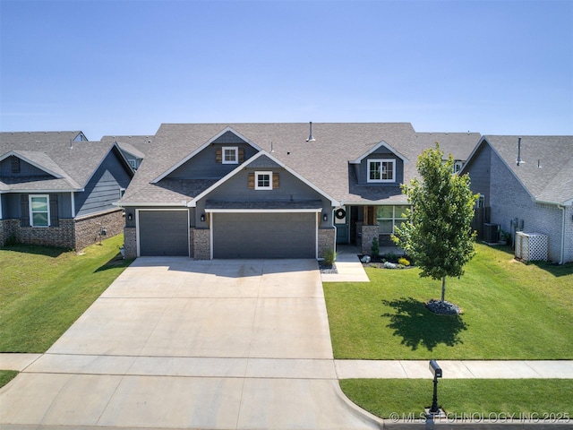7221 S Indianwood Ave, Broken Arrow, OK 74011 - craftsman inspired home featuring driveway, central AC, a front yard, and a shingled roof