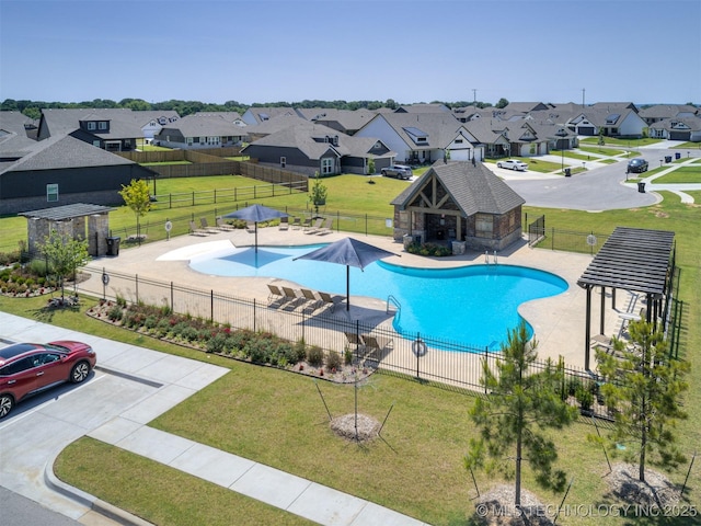 7221 S Indianwood Ave, Broken Arrow, OK 74011 - view of swimming pool with a residential view and a patio area