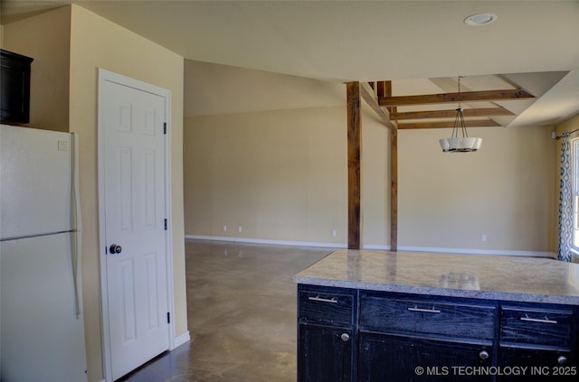 11968 S 270th E Ave, Coweta, OK 74429 - kitchen with freestanding refrigerator, finished concrete floors, blue cabinets, light countertops, and hanging light fixtures