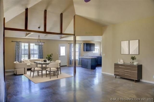 11968 S 270th E Ave, Coweta, OK 74429 - dining area with high vaulted ceiling and concrete flooring